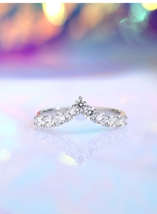 Macro view of S925 sterling silver V-shaped ring with brilliant pavé cubic zirconia