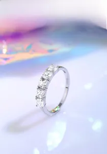 Macro detail of S925 sterling silver ring with five square cut clear zircon stones