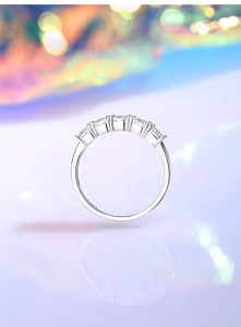 Detail of five princess cut cubic zirconia stones set in a S925 sterling silver band