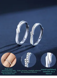 Detail of S925 sterling silver couple rings with twisted design and cubic zirconia stone