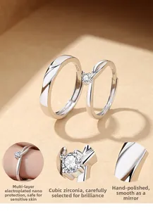 Detailed macro view of S925 sterling silver couple rings with cubic zirconia settings