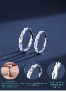 Macro detail of S925 sterling silver twisted ring with hand-polished cubic zirconia