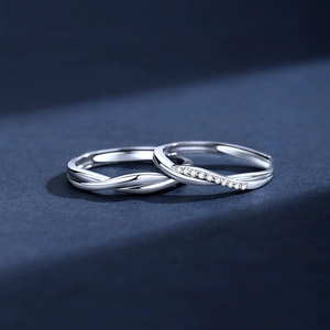 925 Sterling Silver couple rings with intertwined wave design and sparkling zircon accents