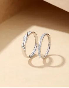 Macro shot of S925 silver Mobius rings showing stone setting and hallmark detail