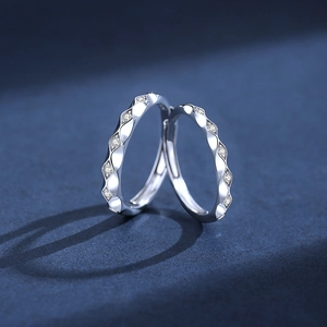 Adjustable S925 sterling silver couple rings with wavy edges and sparkling zircon inlay