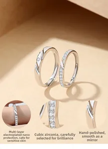 Close-up of S925 sterling silver Mobius rings showing S925 stamp and cubic zirconia stones