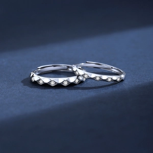 Adjustable S925 sterling silver couple rings with wavy design and inlaid micro diamonds