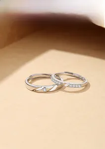 Macro shot of S925 silver Mobius rings with polished finish and cubic zirconia inlay