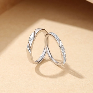 S925 silver Mobius couple rings set with elegant twist design and sparkling diamond accents