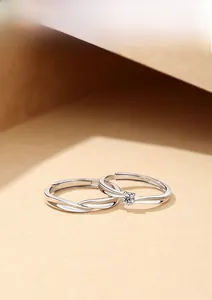 Detail view of S925 sterling silver Mobius rings with adjustable band for couples