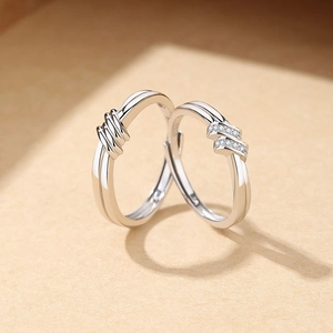 S925 sterling silver knot couple rings with sparkling zircon inlay and open adjustable bands