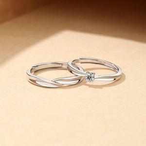S925 sterling silver Mobius couple rings set with adjustable bands and single CZ stone