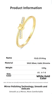 Macro detail of S925 silver heart ring with cubic zirconia inlay and white gold finish