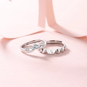 Elegant 925 sterling silver couple rings with wavy diamond accents and geometric patterns