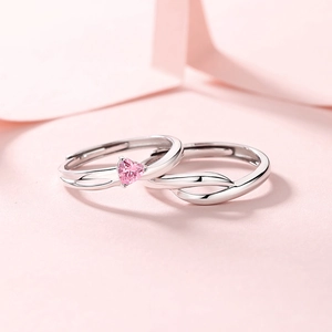 S925 sterling silver couple rings set with pink heart-shaped stone and open-band design