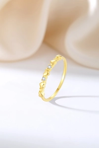 Detailed macro view of S925 sterling silver heart ring with sparkling zircon stones