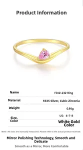Macro shot of V-shaped S925 sterling silver ring with pear-cut pink cubic zirconia