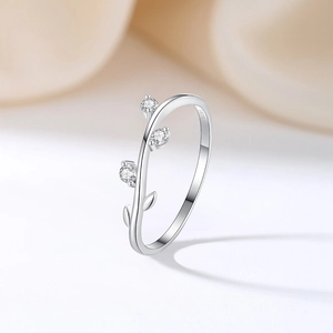 Minimalist S925 sterling silver leaf ring featuring three sparkling cubic zirconia stones