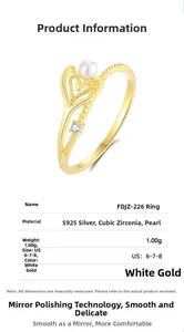 Macro detail of S925 sterling silver fishtail ring with shell pearl and gold finish