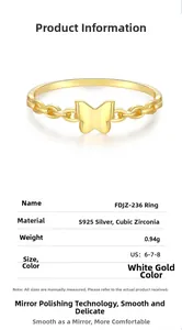 Detail view of gold S925 sterling silver butterfly chain ring with cubic zirconia