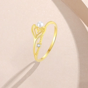 Elegant S925 sterling silver mermaid tail ring with pearl and rhinestone on pink background