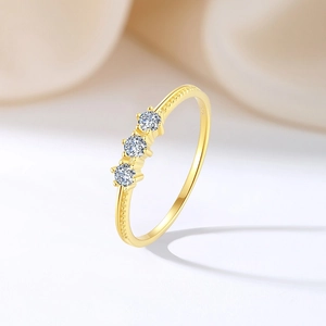 Elegant gold S925 silver ring featuring three micro-set round sparkling zircon stones