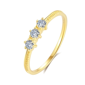 S925 sterling silver gold plated ring featuring three brilliant cubic zirconia stones
