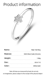 Macro shot of S925 silver star ring with micro-set zircons and white gold finish details