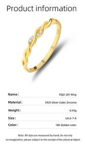 Macro shot of twisted 18K gold S925 silver ring featuring S925 hallmark and cubic zirconia