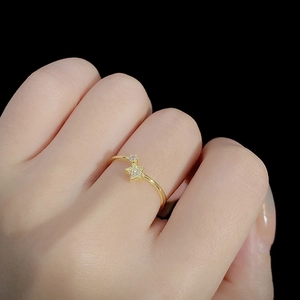 Sparkling gold star-shaped open ring for women with pave zircon and delicate stackable design