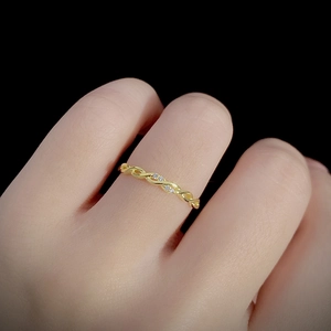 Braided twist gold ring in S925 silver with three small sparkling zircon stones