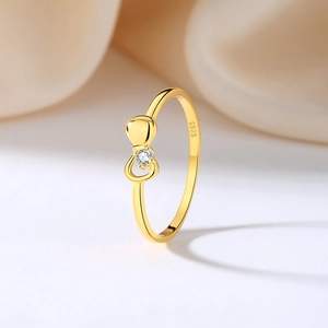 Elegant gold S925 sterling silver bow ring with a sparkling round zircon center stone