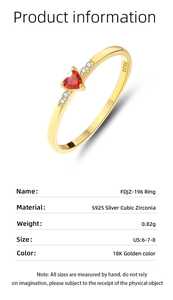 Detail van S925 zilveren ring met een rode hart zirkoon en 18K gouden finish