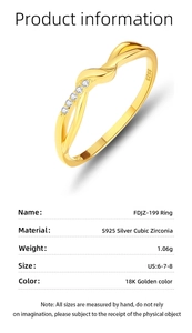 Detail of 18K gold S925 silver twist ring with s925 stamp and cubic zirconia stones