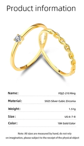 Macro detail of S925 sterling silver ring set with 18K gold plating and cubic zirconia