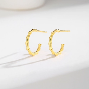 Classic S925 silver bamboo joint gold earrings with polished minimalist texture