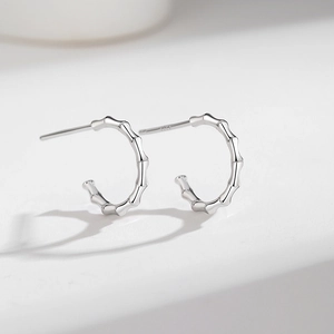 Classic S925 sterling silver bamboo style hoop earrings with minimalist texture finish