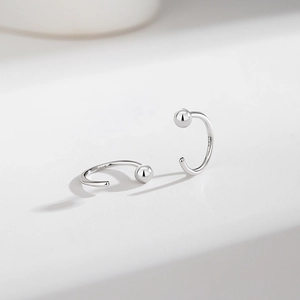 Minimalist S925 sterling silver C-shaped stud earrings with polished metal sphere design