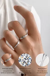 Detail of silver Mobius rings with cubic zirconia inlay and hand-polished finish