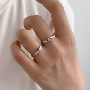 S925 silver Mobius couple rings set featuring a sparkling diamond band and a twist ring