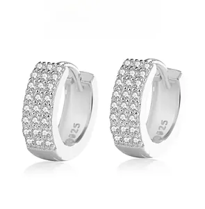 Detailed close-up of S925 silver hoop earrings with three rows of micro-paved zircons