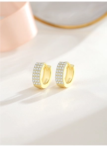 Detail showing three rows of micro-pave zircons on gold S925 silver hoop earrings