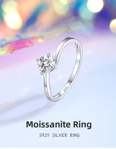 Macro detail of S925 silver moissanite ring showing four-prong setting and hallmark