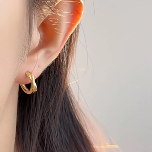 Minimalist S925 silver gold intertwined hoop earrings with a polished triple band design