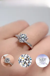 Detail view of 1ct round moissanite ring with six-prong setting and mirror polished finish