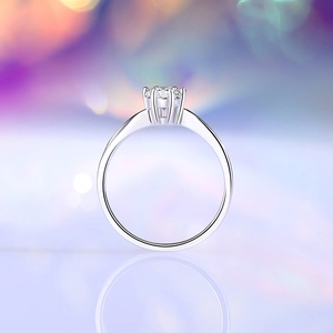 Elegant S925 sterling silver ring featuring a classic six-prong round moissanite setting