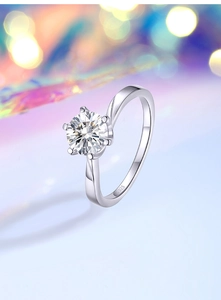 Macro detail of S925 sterling silver stamp and six-prong round moissanite ring