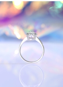Detailed view of S925 silver ring featuring a six-petal flower-shaped moissanite stone