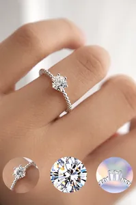 Detail of 5mm moissanite ring with beaded band and 6-prong setting in S925 silver
