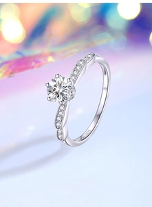Macro view of S925 sterling silver ring with six-prong moissanite and twisted band